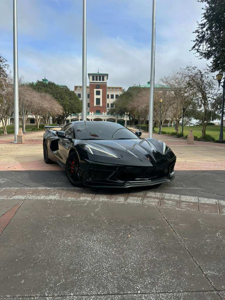 2023 Corvette C8 parked outdoors showcasing its sleek black design and ...