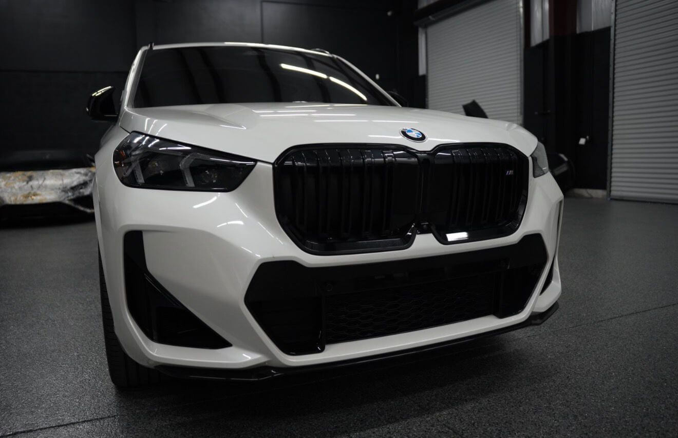 2024 BMW X1 M35i front view showcasing its luxury design and striking style.