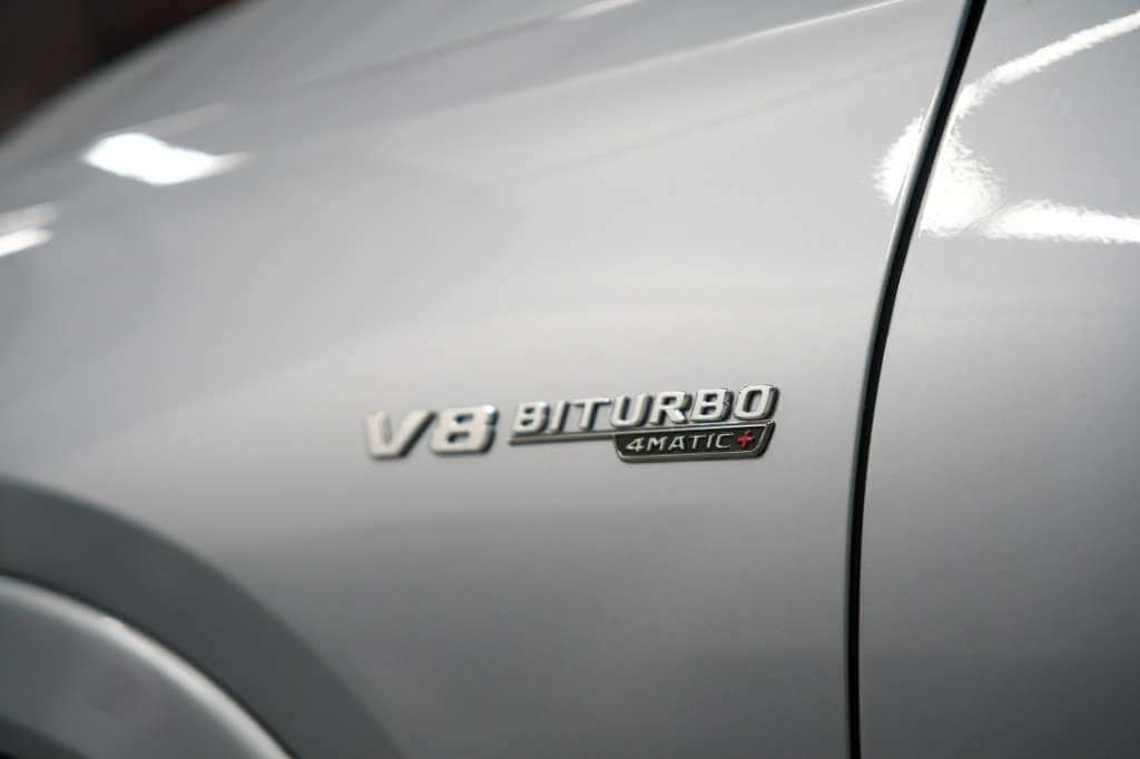 V8 Biturbo 4MATIC badge on the sleek 2024 Mercedes GLE 63S in silver finish.