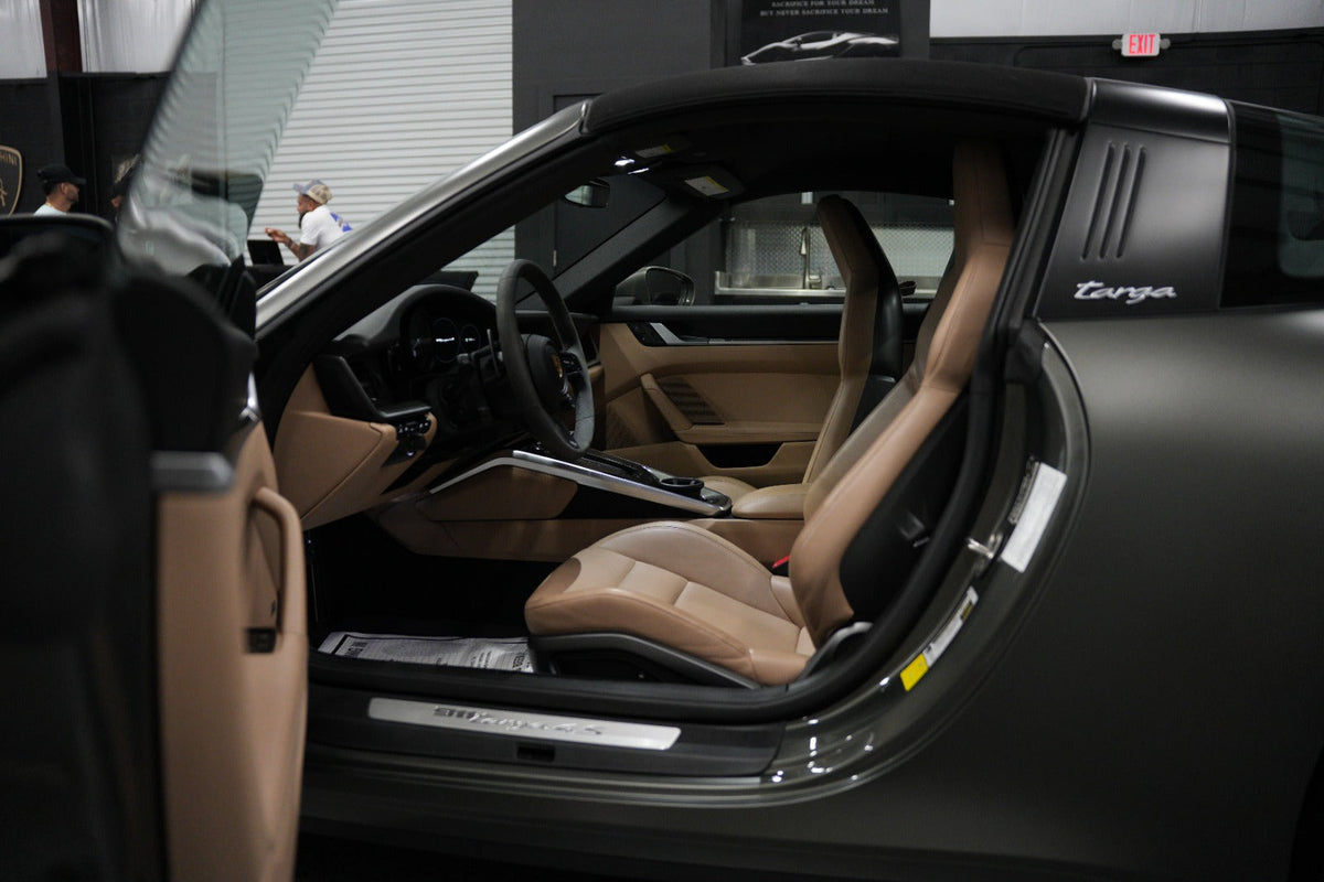 Interior view of a luxury Porsche 911 Targa 4S sports car with tan ...