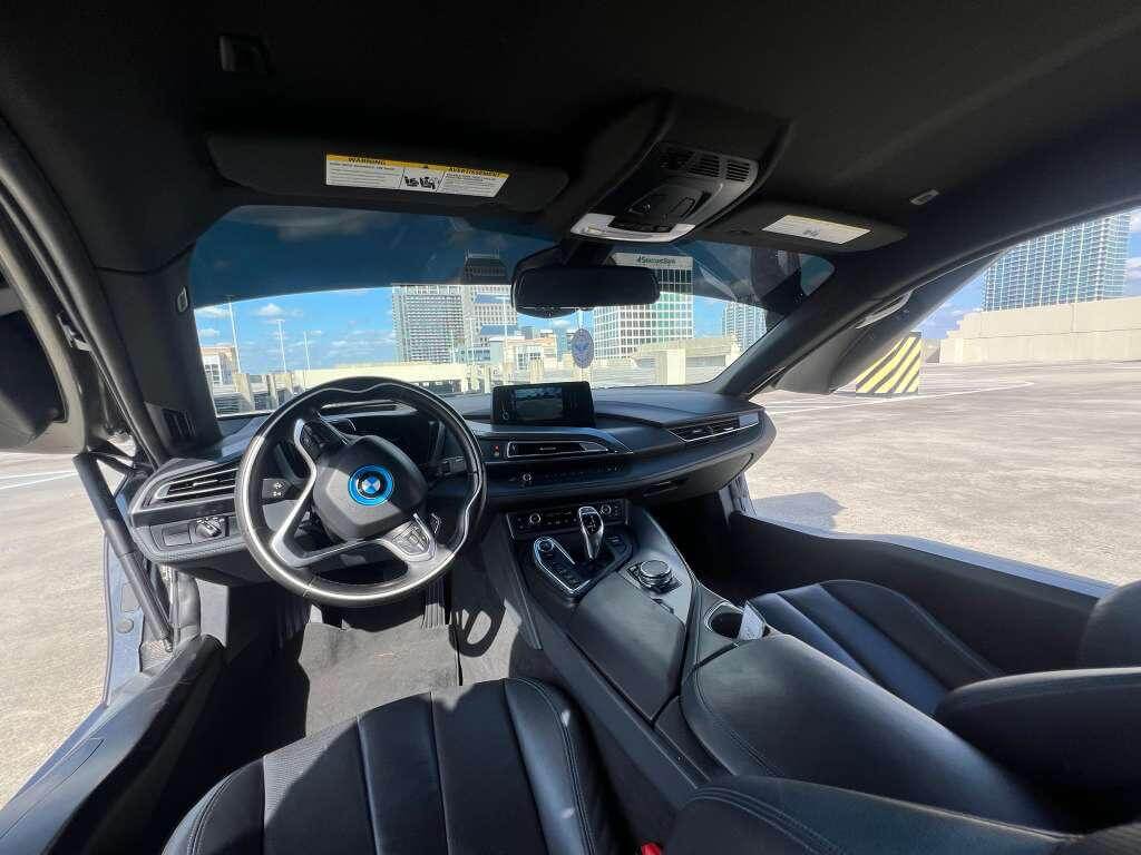 BMW i8 interior showcasing luxury features and advanced technology in exotic car rental Orlando.