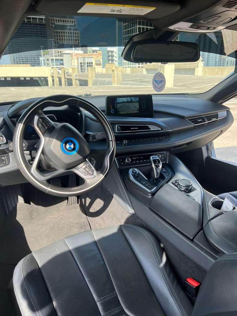 Interior view of the BMW i8 showcasing its luxury features and advanced technology.