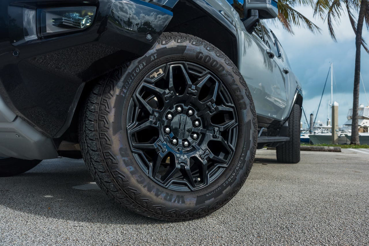 GMC Hummer EV SUV 22-inch black wheels with Goodyear Wrangler Territory all-terrain tyres