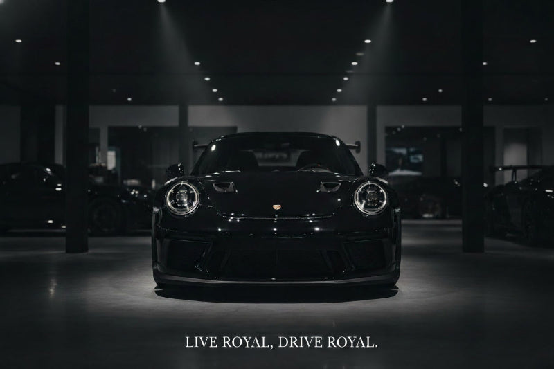 Black Porsche car in a showroom for rent